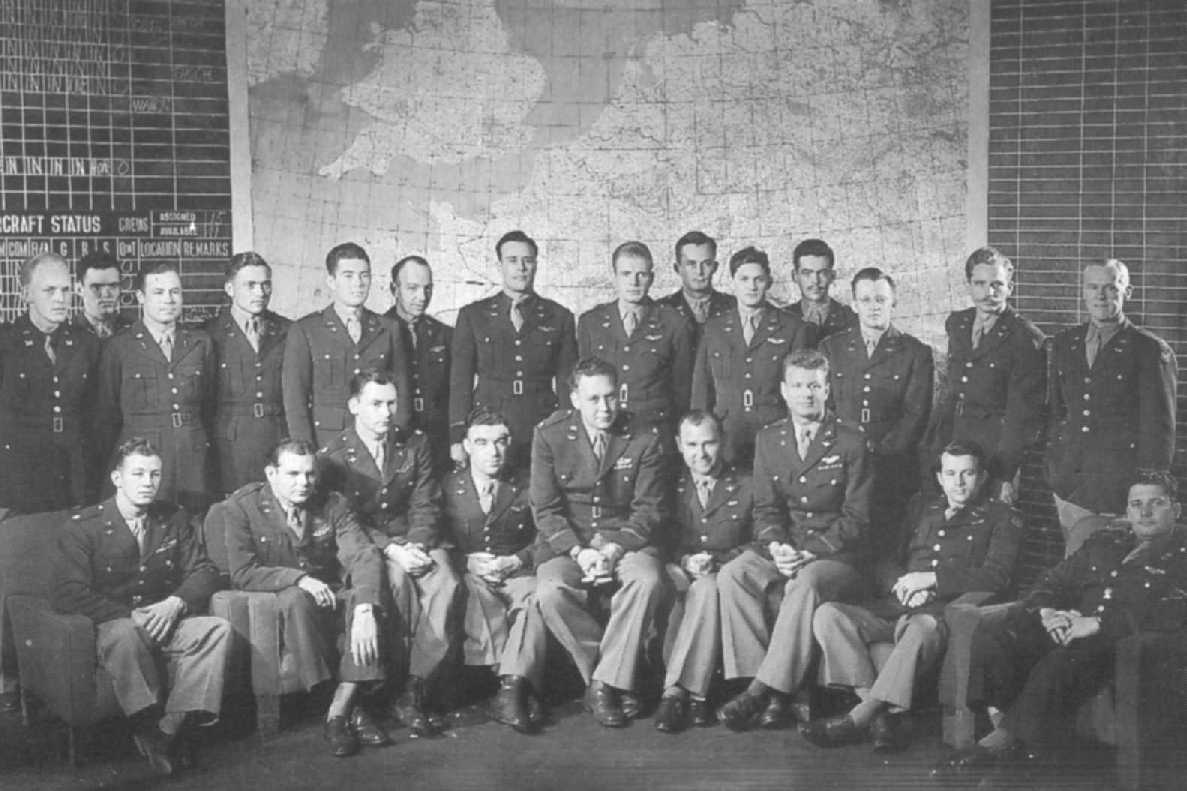 492nd Group Headquarters Officers in front of the Operations Room map